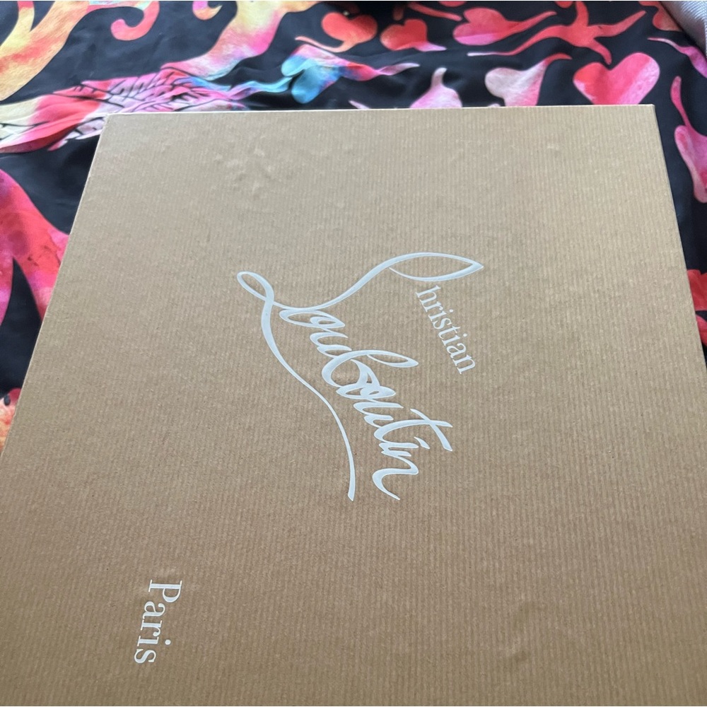 Brand new Christian Louboutin white boots with the silver toe size EU40